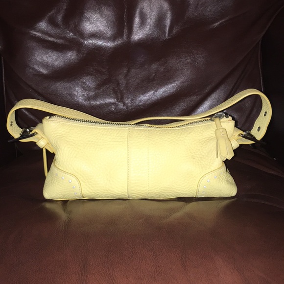 small yellow coach purse